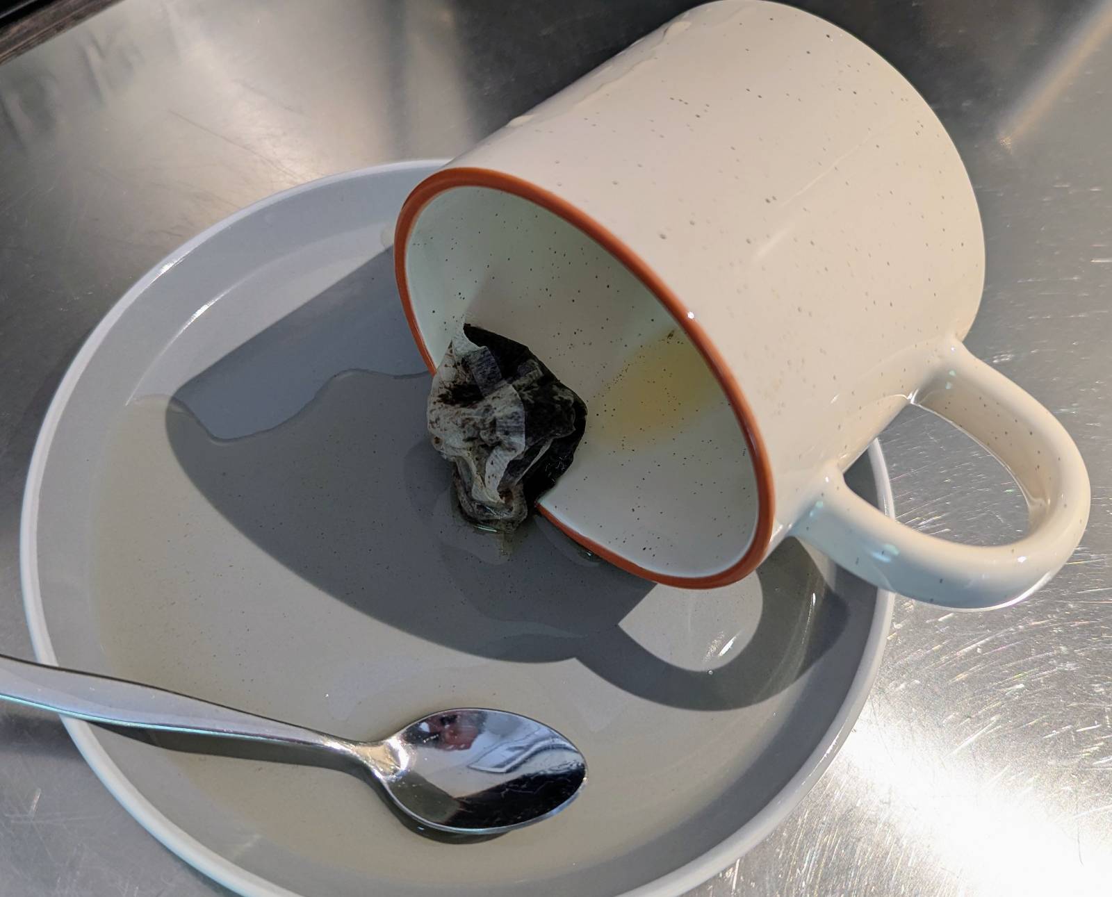 A spilled mug of tea